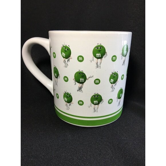 Green M&M Many Faces 16oz Ceramic White Coffee Tea Mug Cup Mars 2018 Sexy Lady - Picture 3 of 6